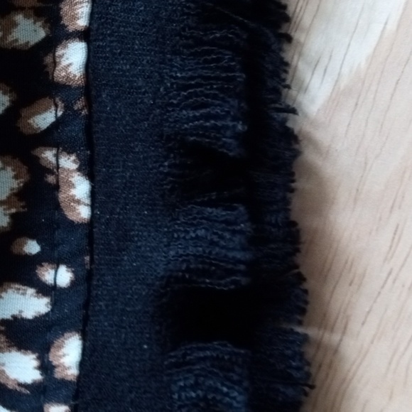 Umgee medium animal print front, solid black cheeky shorts with fringed hem. NWT - Picture 7 of 7